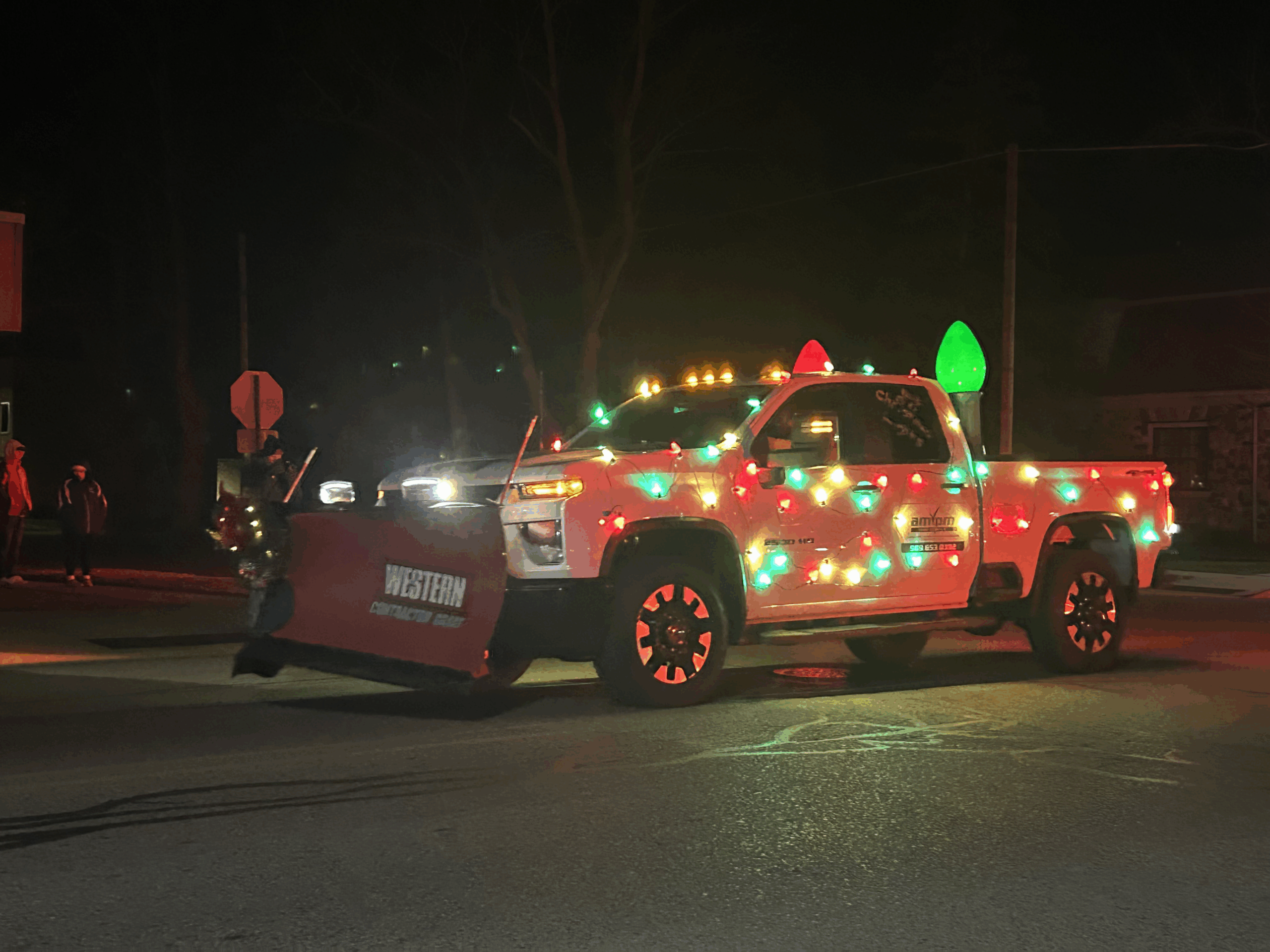 AMPM Yard Service truck decorated for Santa Parade in Standish